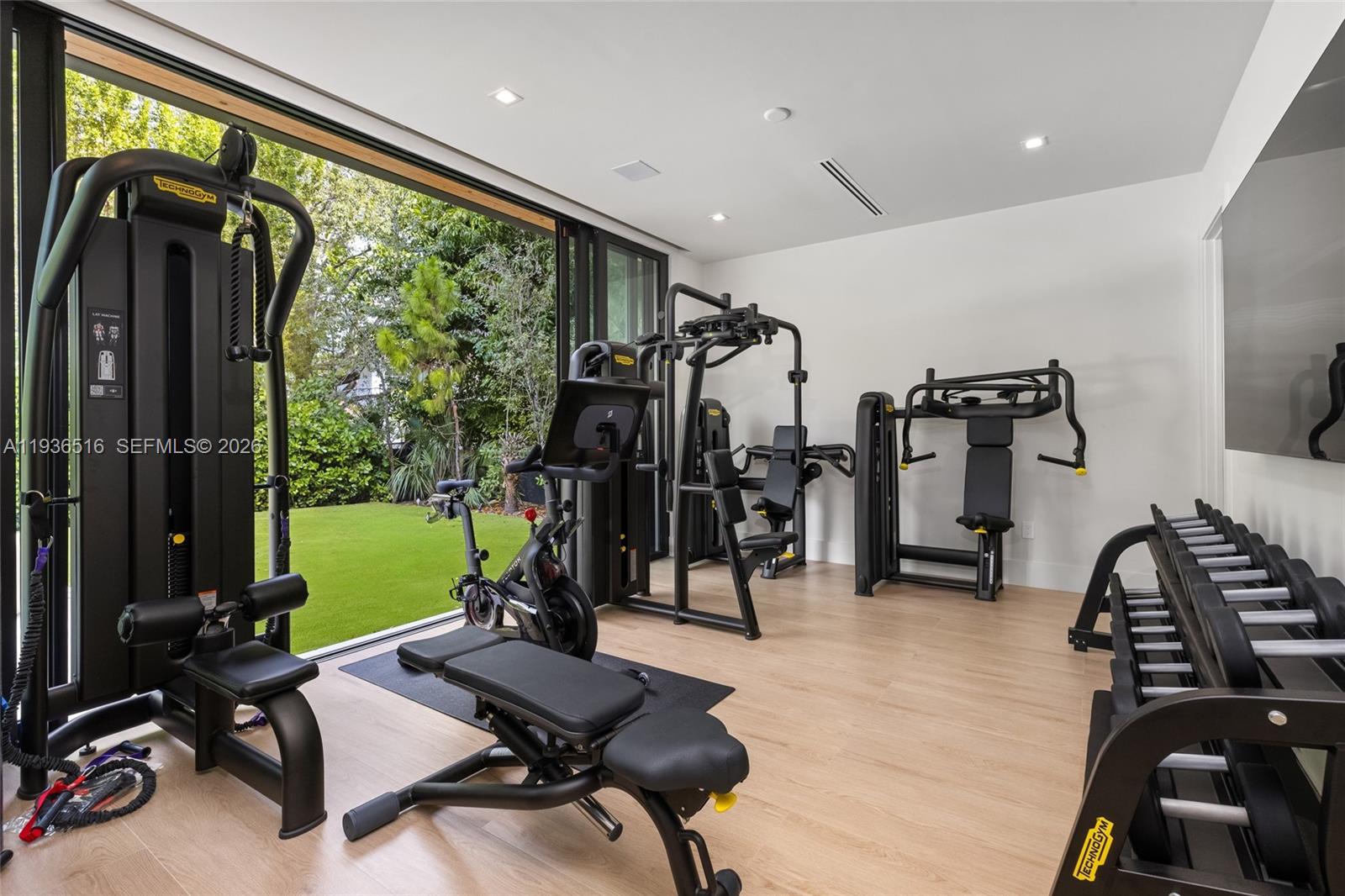 6003 Southwest 80th Street South Miami, FL 33143 - Photo 36 of 98 a view of a room with gym equipment