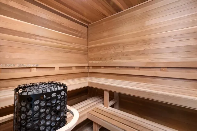 a bathroom with a toilet sink and shower