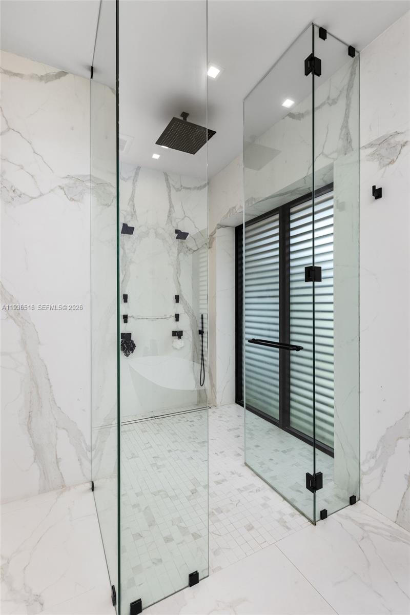 6003 Southwest 80th Street South Miami, FL 33143 - Photo 50 of 98 a bathroom with a shower