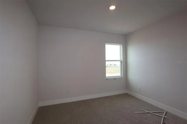 a house with trees in the background