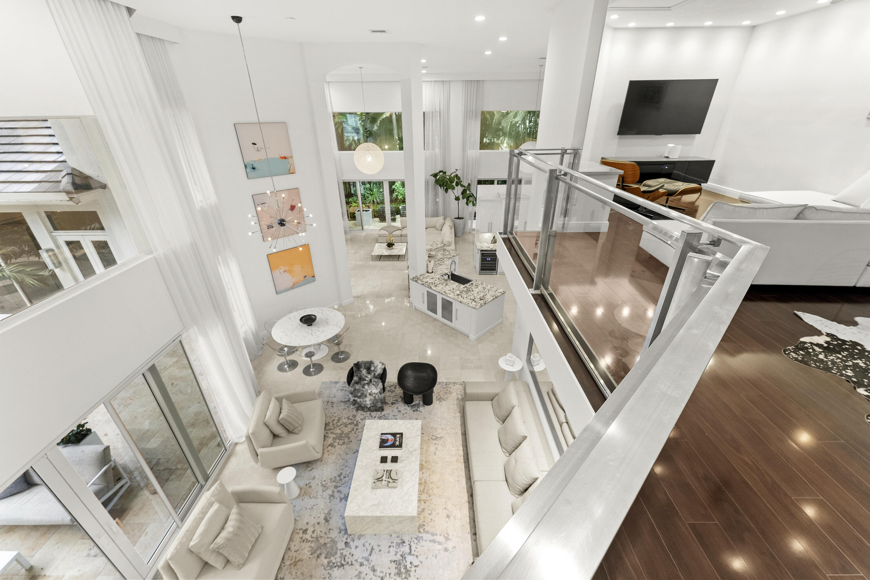 3156 Northwest 61st Street Boca Raton, FL 33496 - Photo 27 of 46 a living room with furniture and a flat screen tv