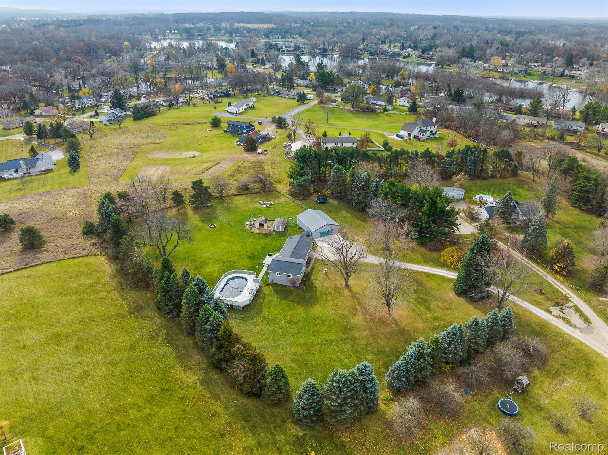 1065 Clyde Road Highland, MI 48357 - Photo 49 of 64 Surrounded by trees