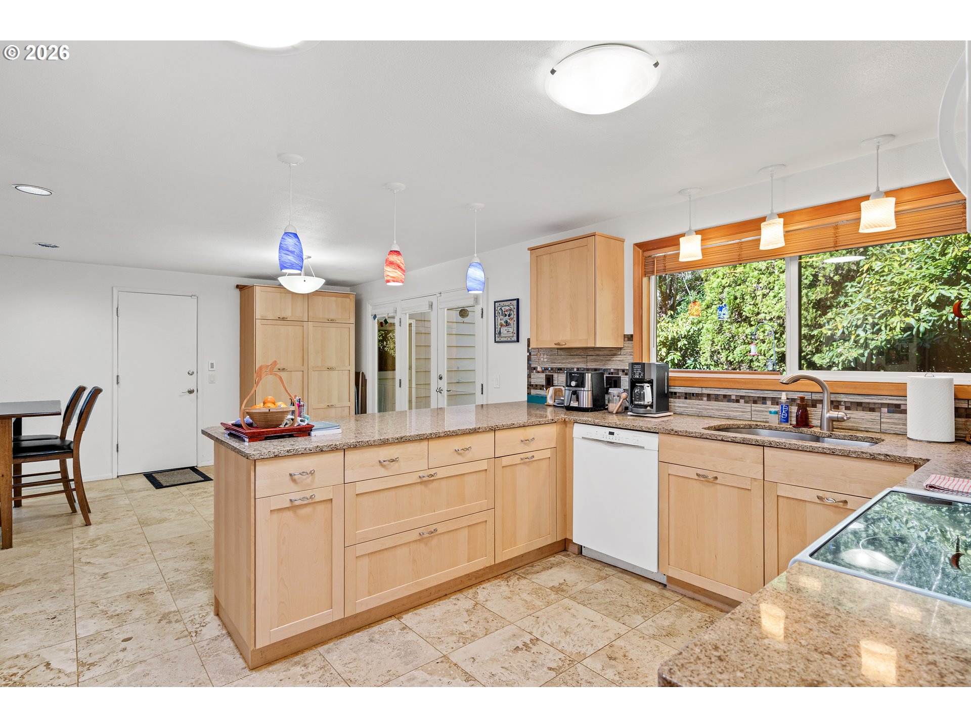 214 Northwest Seblar Drive Portland, OR 97210 - Photo 11 of 36 a kitchen with a sink cabinets and window