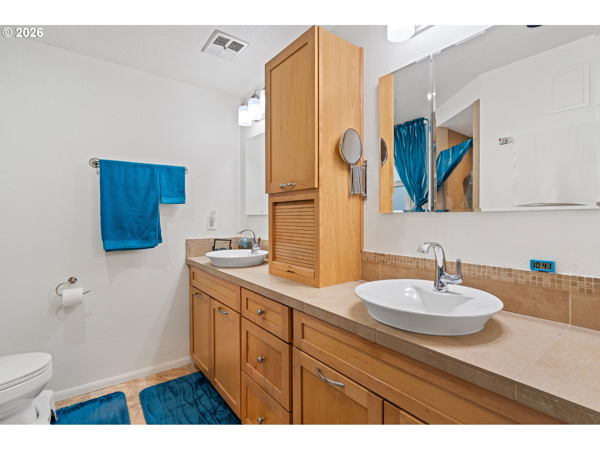 214 Northwest Seblar Drive Portland, OR 97210 - Photo 15 of 36 a bathroom with a sink and a mirror