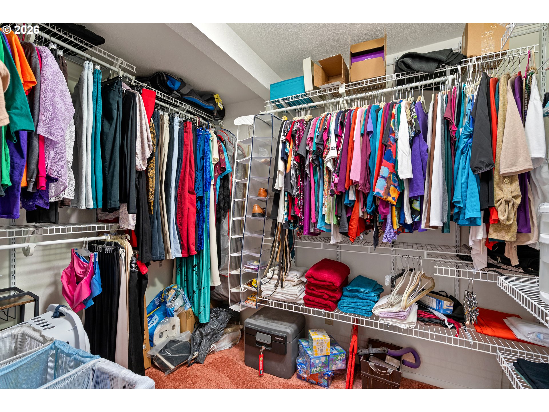 214 Northwest Seblar Drive Portland, OR 97210 - Photo 17 of 36 a view of walk in closet with clothes