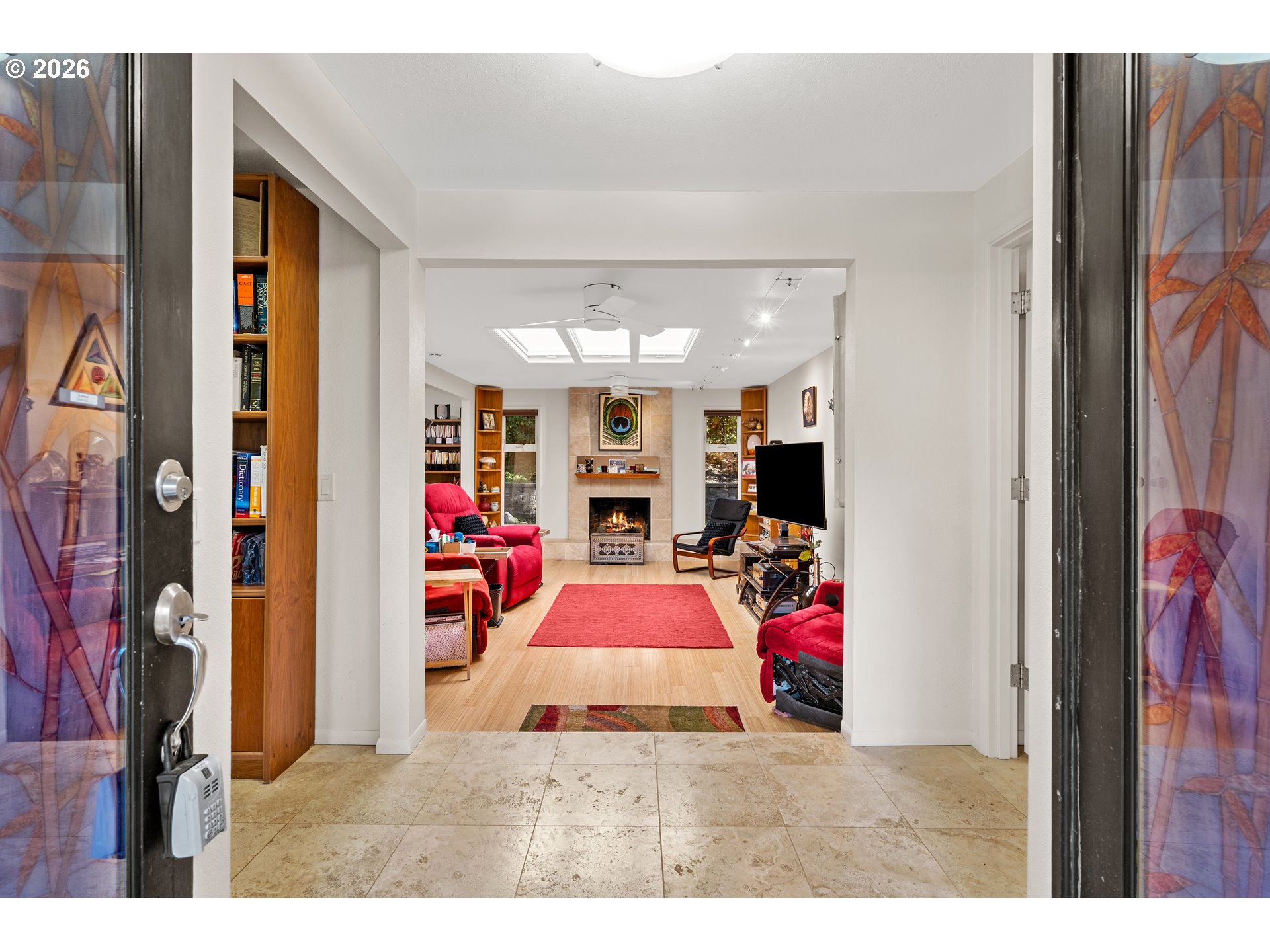 214 Northwest Seblar Drive Portland, OR 97210 - Photo 4 of 36 a room with lots of furniture and flat screen tv