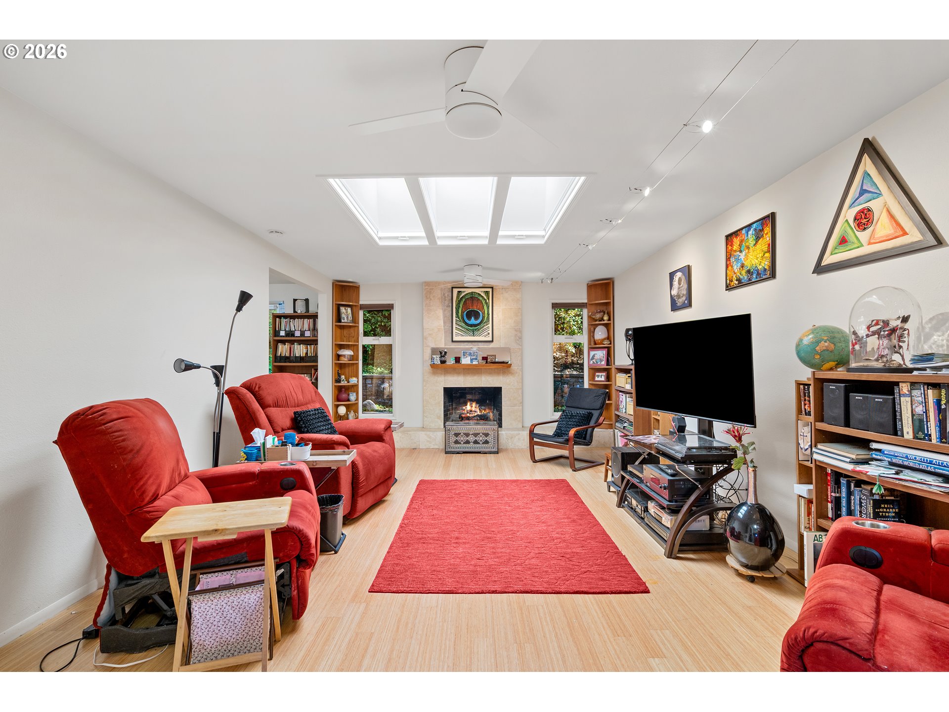 214 Northwest Seblar Drive Portland, OR 97210 - Photo 5 of 36 a living room with furniture and a flat screen tv