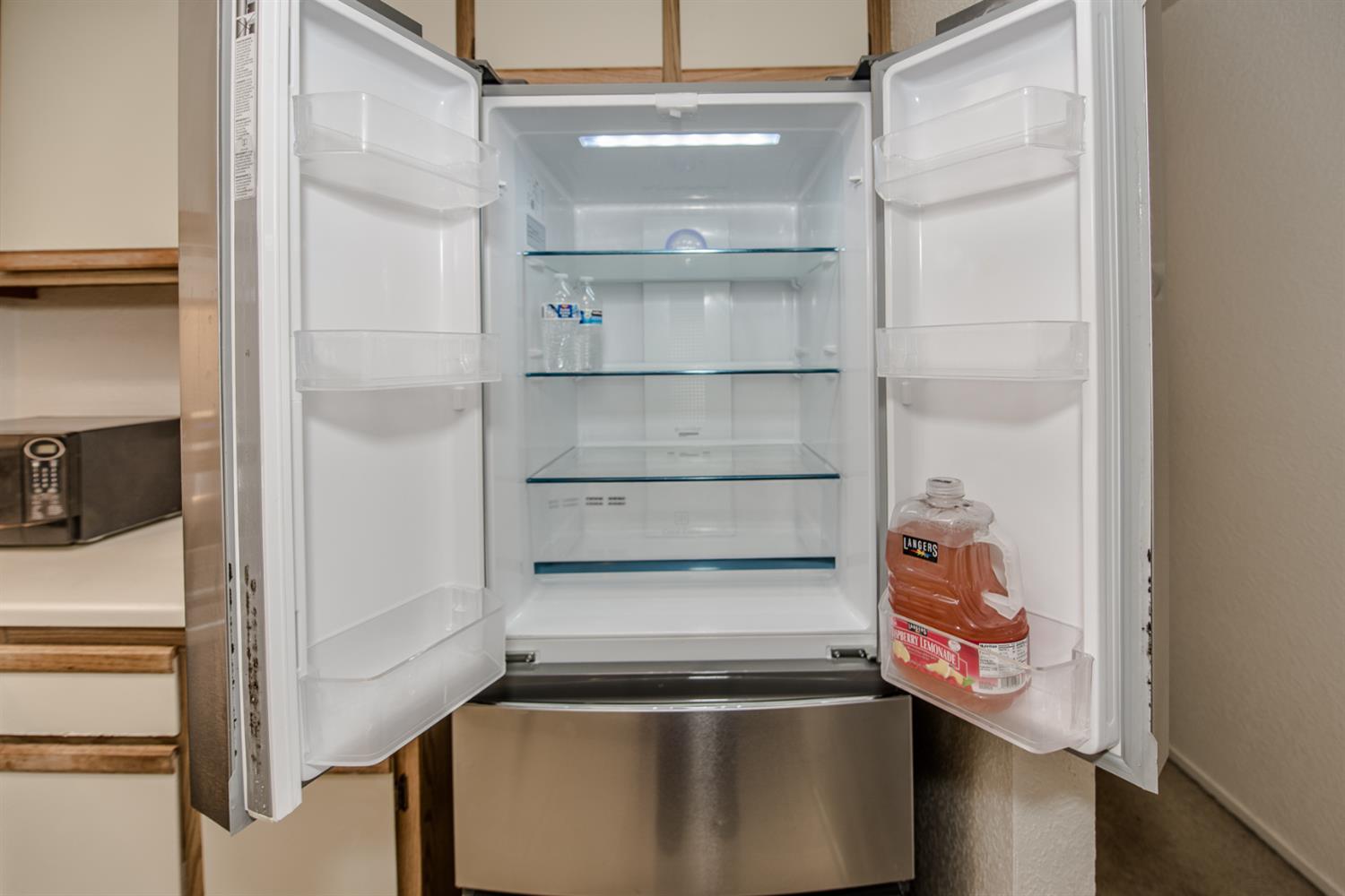 1019 Dornajo Way, Unit 244 Sacramento, CA 95825 - Photo 11 of 41 a view of walk in closet with empty racks