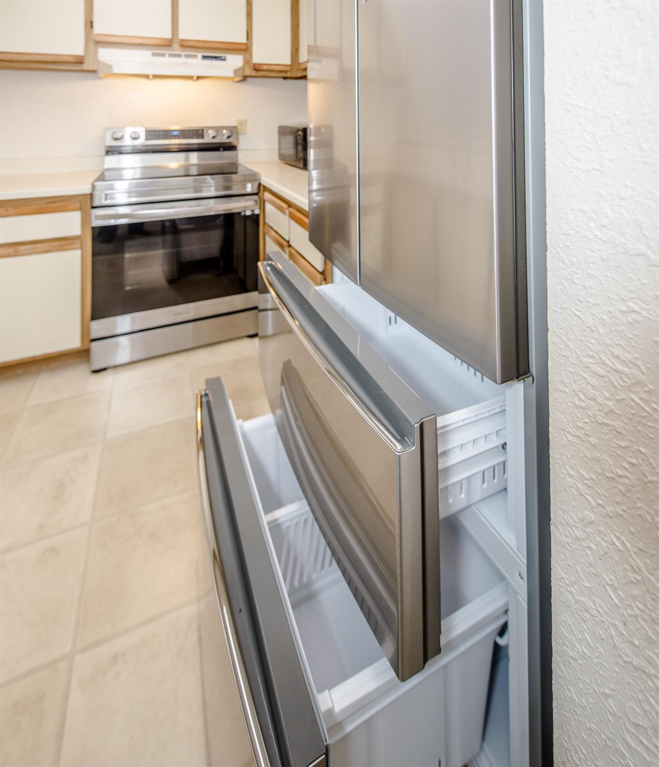 1019 Dornajo Way, Unit 244 Sacramento, CA 95825 - Photo 12 of 41 a view of an empty room and wooden floor