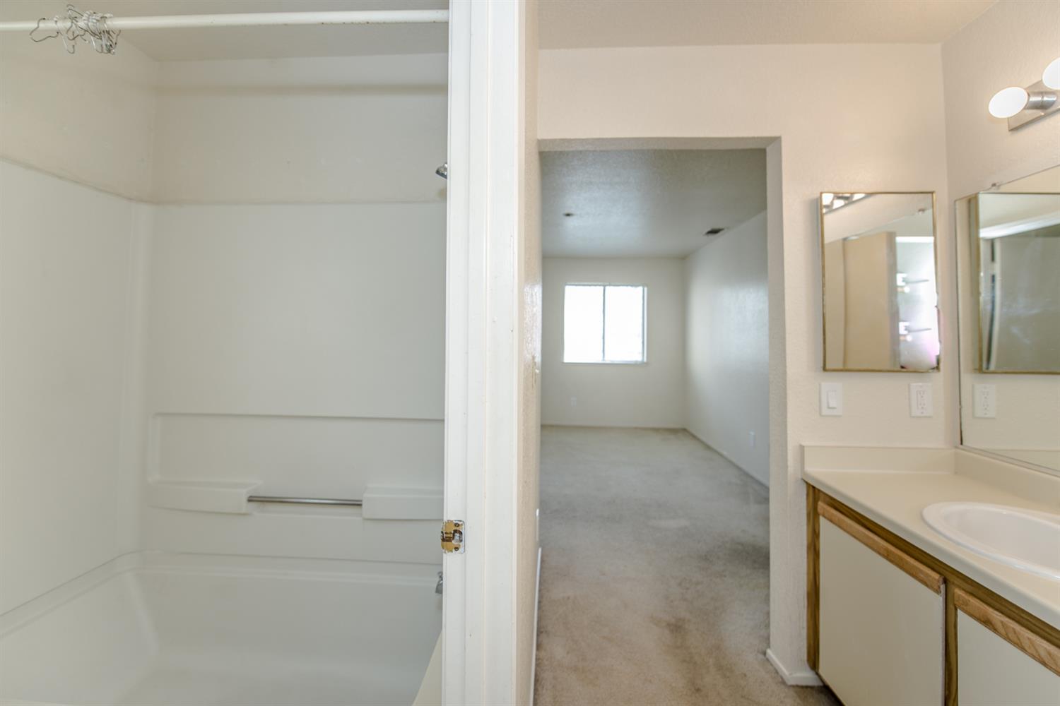 1019 Dornajo Way, Unit 244 Sacramento, CA 95825 - Photo 18 of 41 a view of a bathroom from the hallway