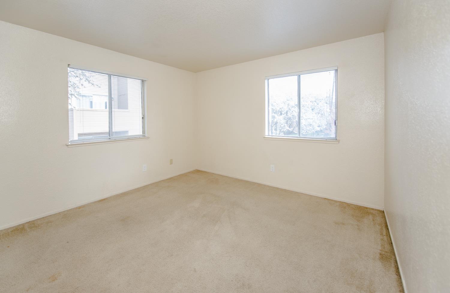 1019 Dornajo Way, Unit 244 Sacramento, CA 95825 - Photo 19 of 41 an empty room with windows