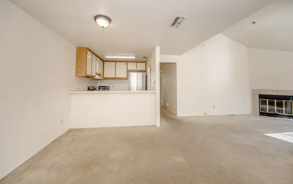 a view of a kitchen with a sink