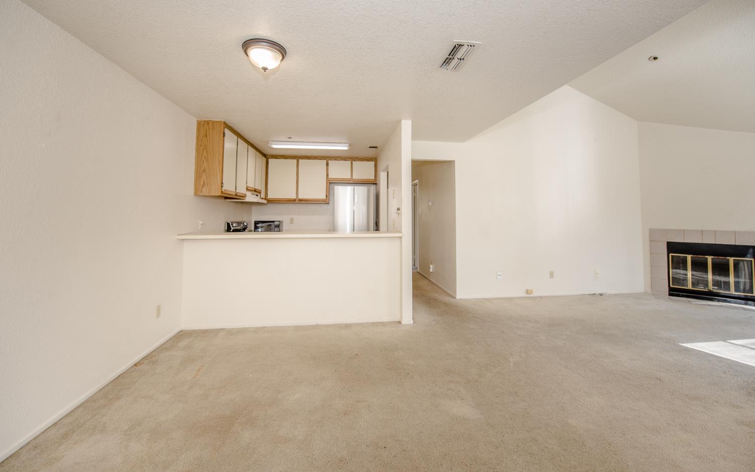 1019 Dornajo Way, Unit 244 Sacramento, CA 95825 - Photo 2 of 41 a view of a kitchen with a sink