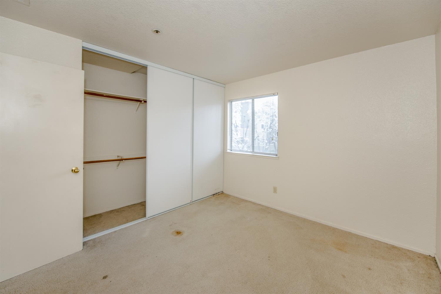 1019 Dornajo Way, Unit 244 Sacramento, CA 95825 - Photo 21 of 41 a view of an empty room with a window