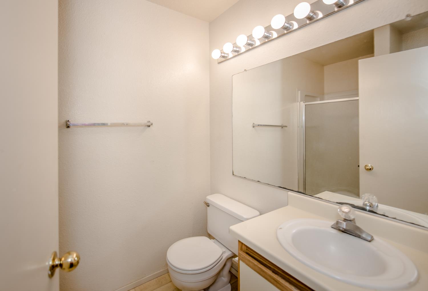 1019 Dornajo Way, Unit 244 Sacramento, CA 95825 - Photo 22 of 41 a bathroom with a sink toilet and shower