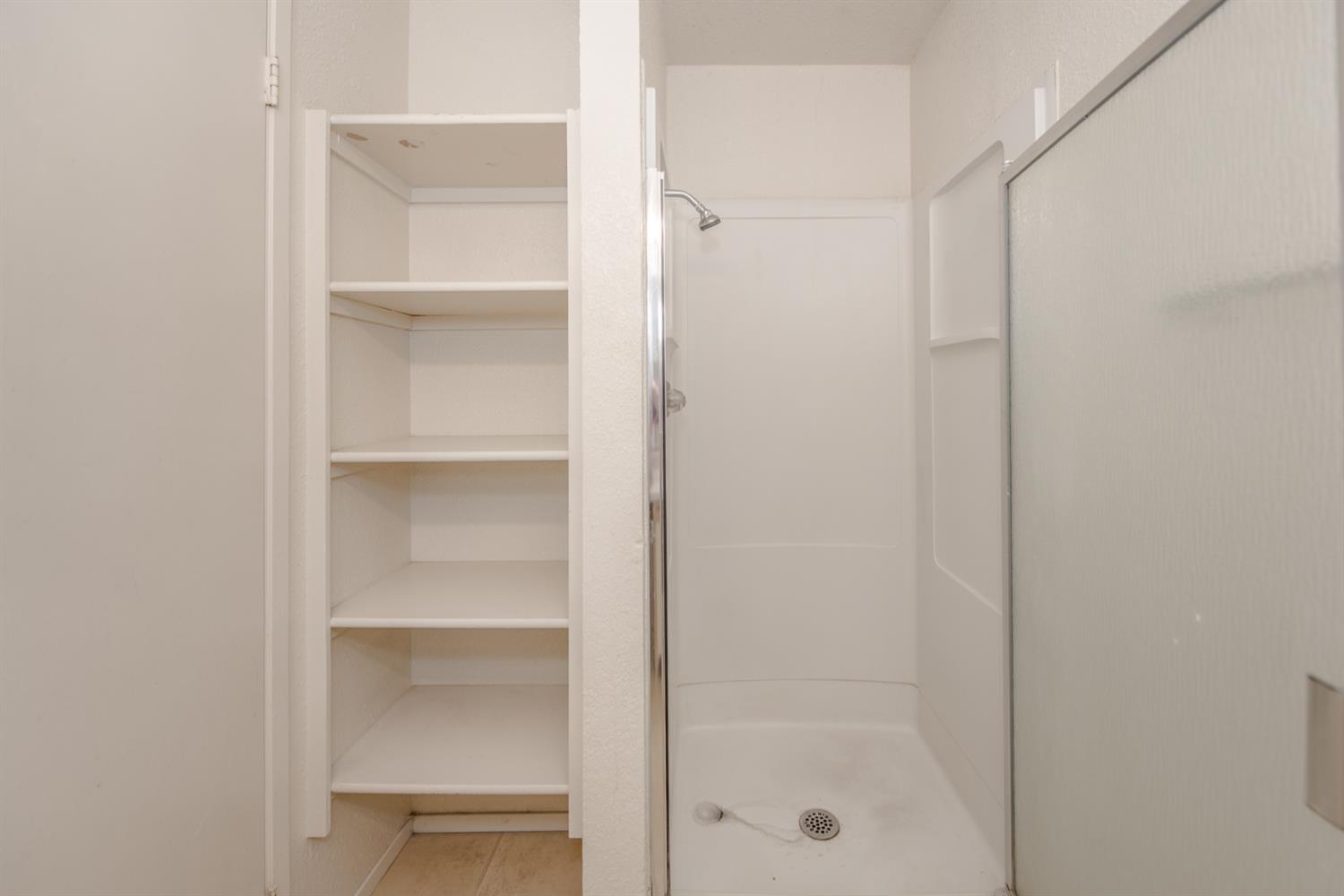 1019 Dornajo Way, Unit 244 Sacramento, CA 95825 - Photo 23 of 41 a bathroom with a shower