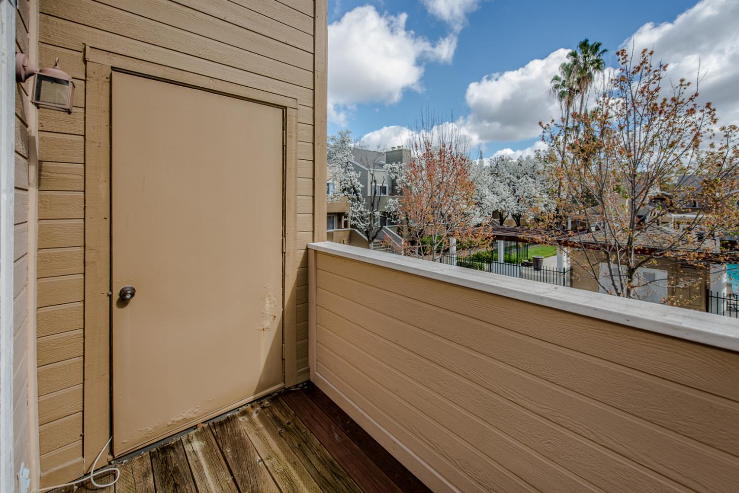 1019 Dornajo Way, Unit 244 Sacramento, CA 95825 - Photo 29 of 41 a view of a balcony with trees