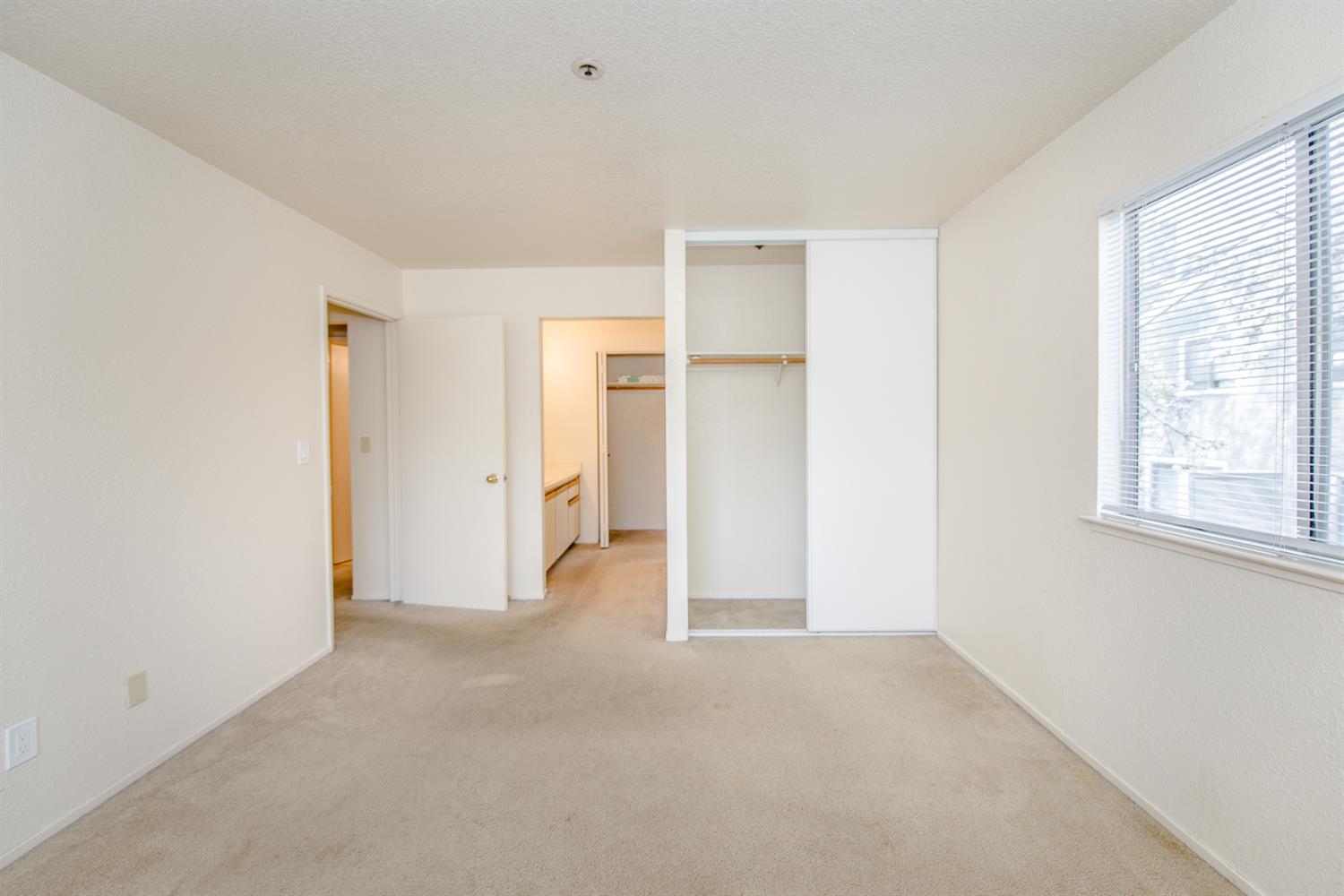 1019 Dornajo Way, Unit 244 Sacramento, CA 95825 - Photo 3 of 41 a view of empty room with windows and entryway