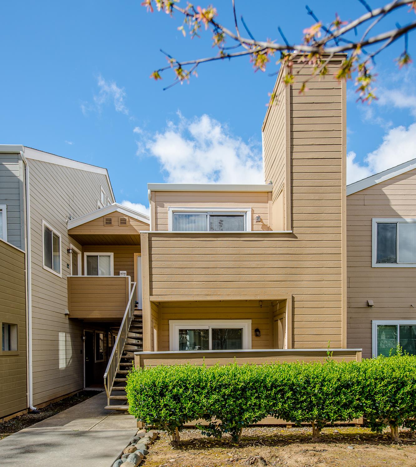 1019 Dornajo Way, Unit 244 Sacramento, CA 95825 - Photo 40 of 41 a view of a building with a window and garage