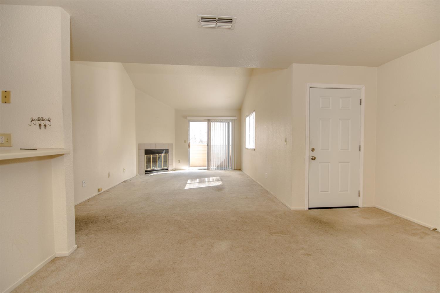 1019 Dornajo Way, Unit 244 Sacramento, CA 95825 - Photo 5 of 41 a view of a livingroom with a fireplace