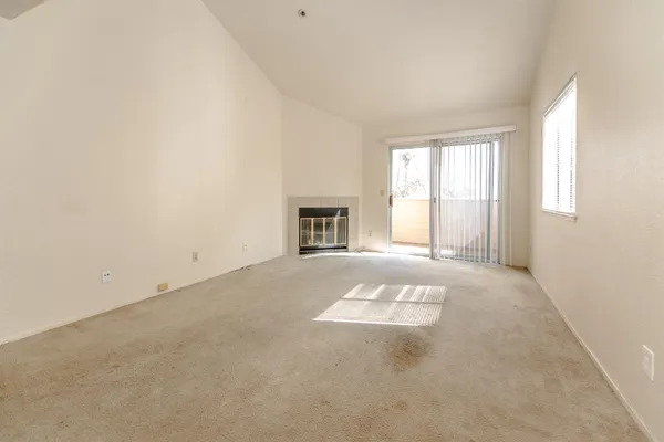 an empty room with windows