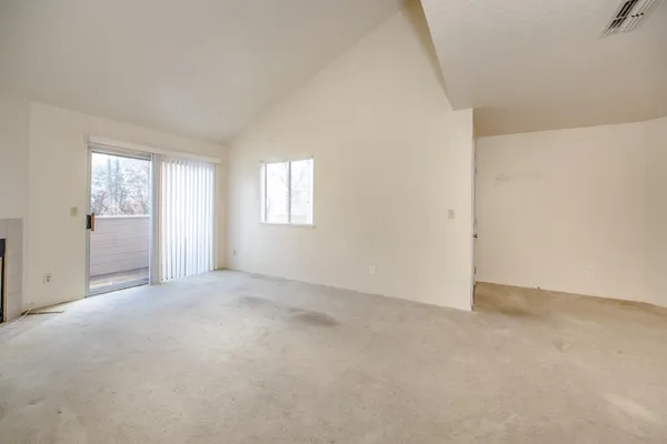 an empty room with windows