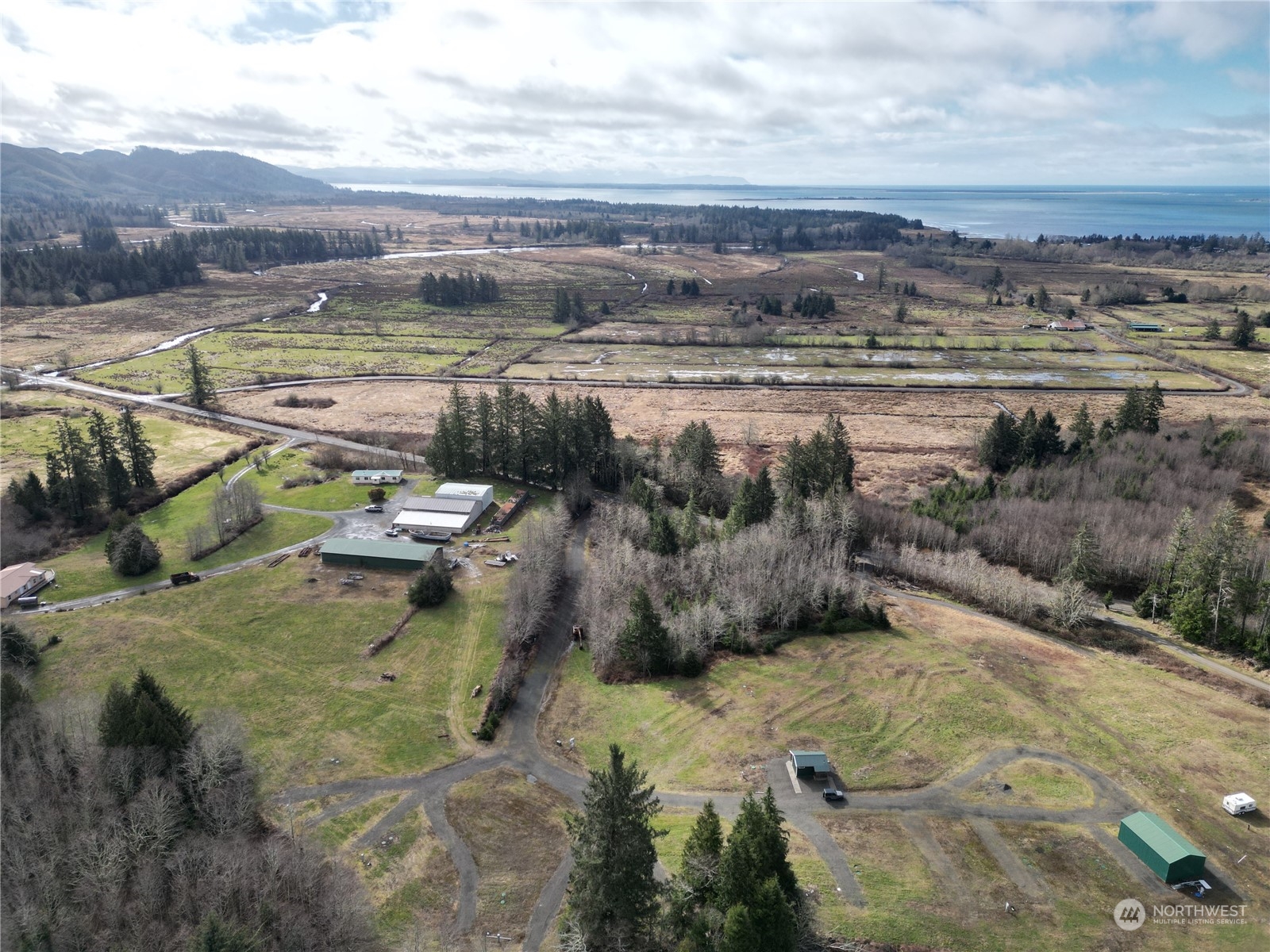 630 Chinook Valley Road Long Beach, WA 98631 - Photo 26 of 27 a view of a yard with an outdoor space