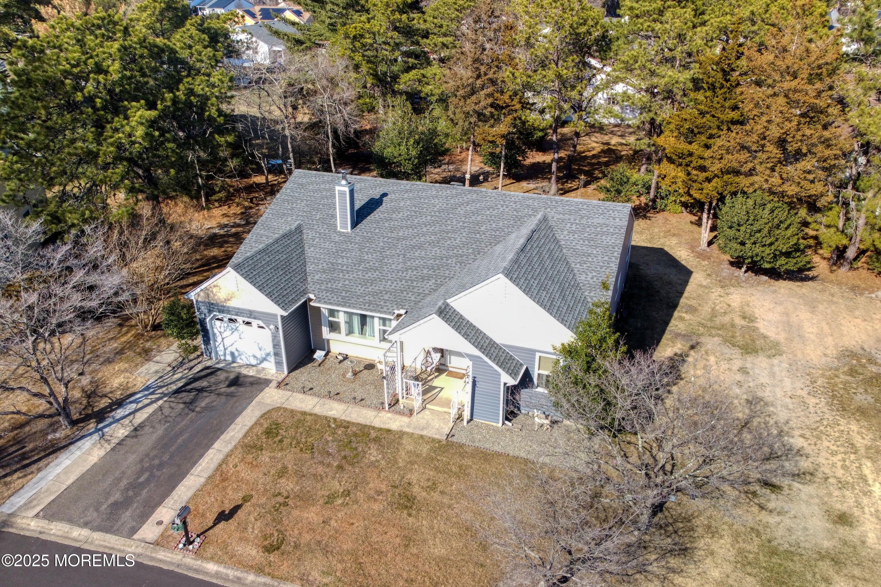 19 Amesbury Road Whiting, NJ 08759 - Photo 24 of 26 an aerial view of a house with a yard basket ball court and outdoor seating