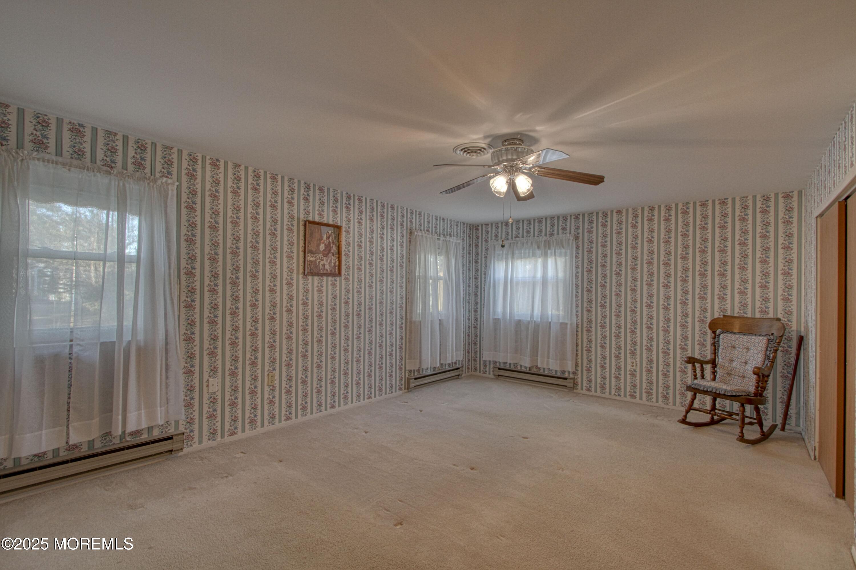 19 Amesbury Road Whiting, NJ 08759 - Photo 9 of 26 a view of an empty room with a window