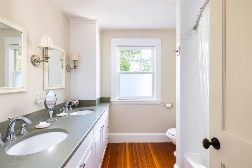 160 Allen Avenue Waban, MA 02468 - Photo 13 of 19 a bathroom with a sink a toilet and shower