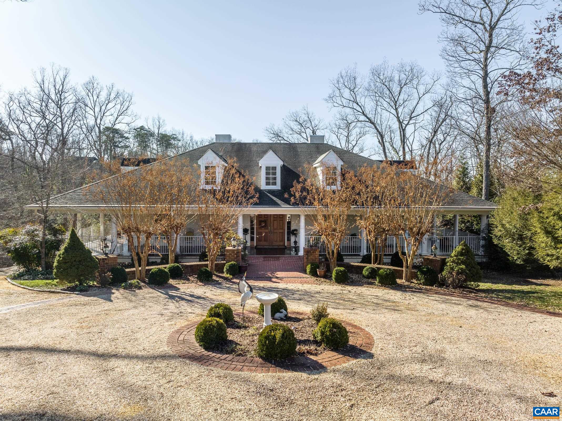 a view of a building with snow on the road
