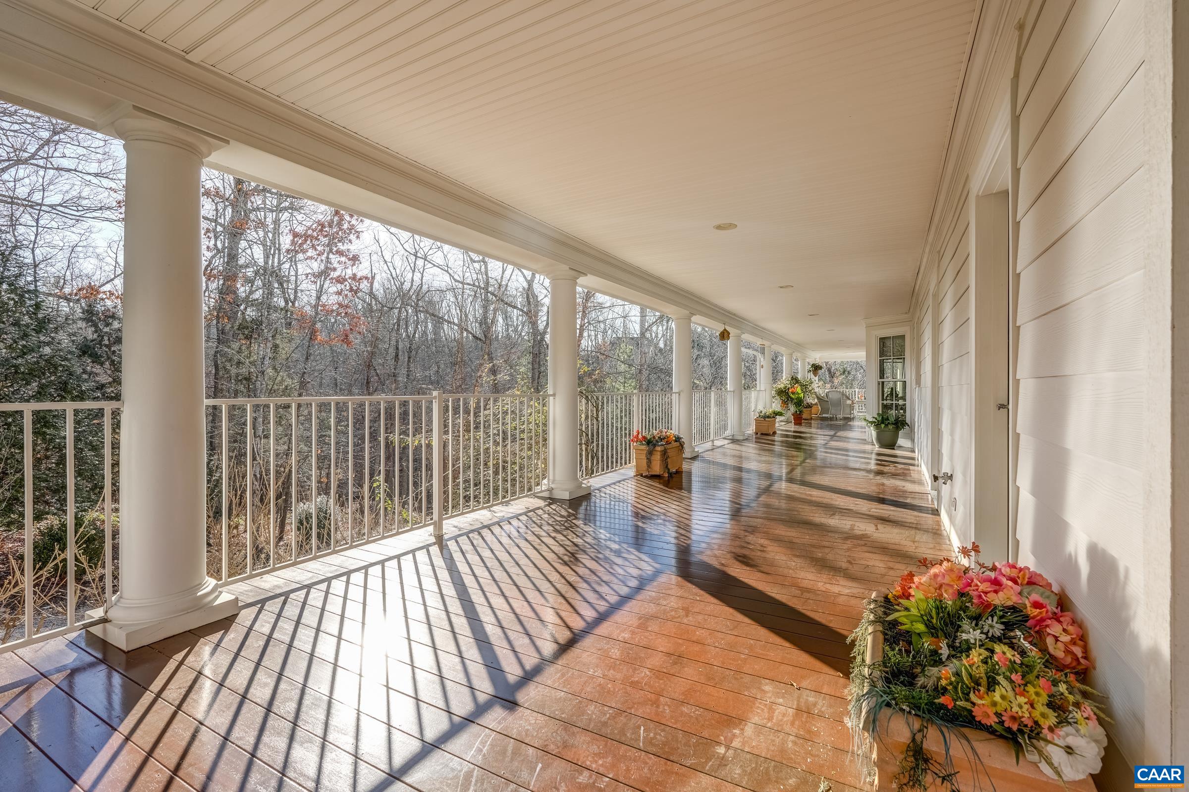 1849 Westerham Street Keswick, VA 22947 - Photo 18 of 75 a lobby with furniture and floor to ceiling window
