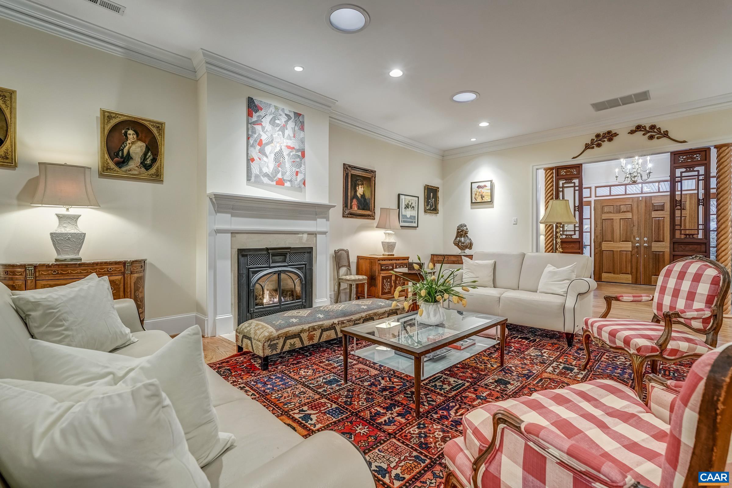 1849 Westerham Street Keswick, VA 22947 - Photo 28 of 75 a living room with furniture and a fireplace