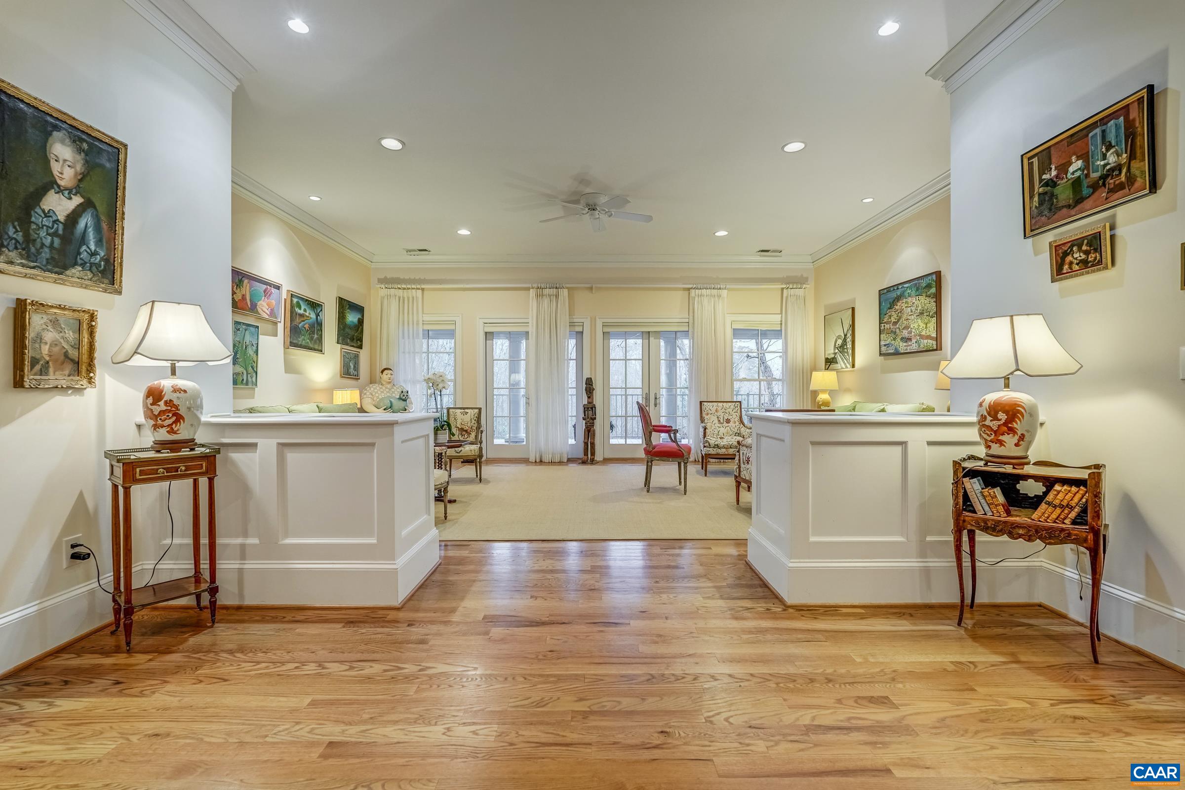 1849 Westerham Street Keswick, VA 22947 - Photo 32 of 75 a living room with kitchen island furniture and a wooden floor
