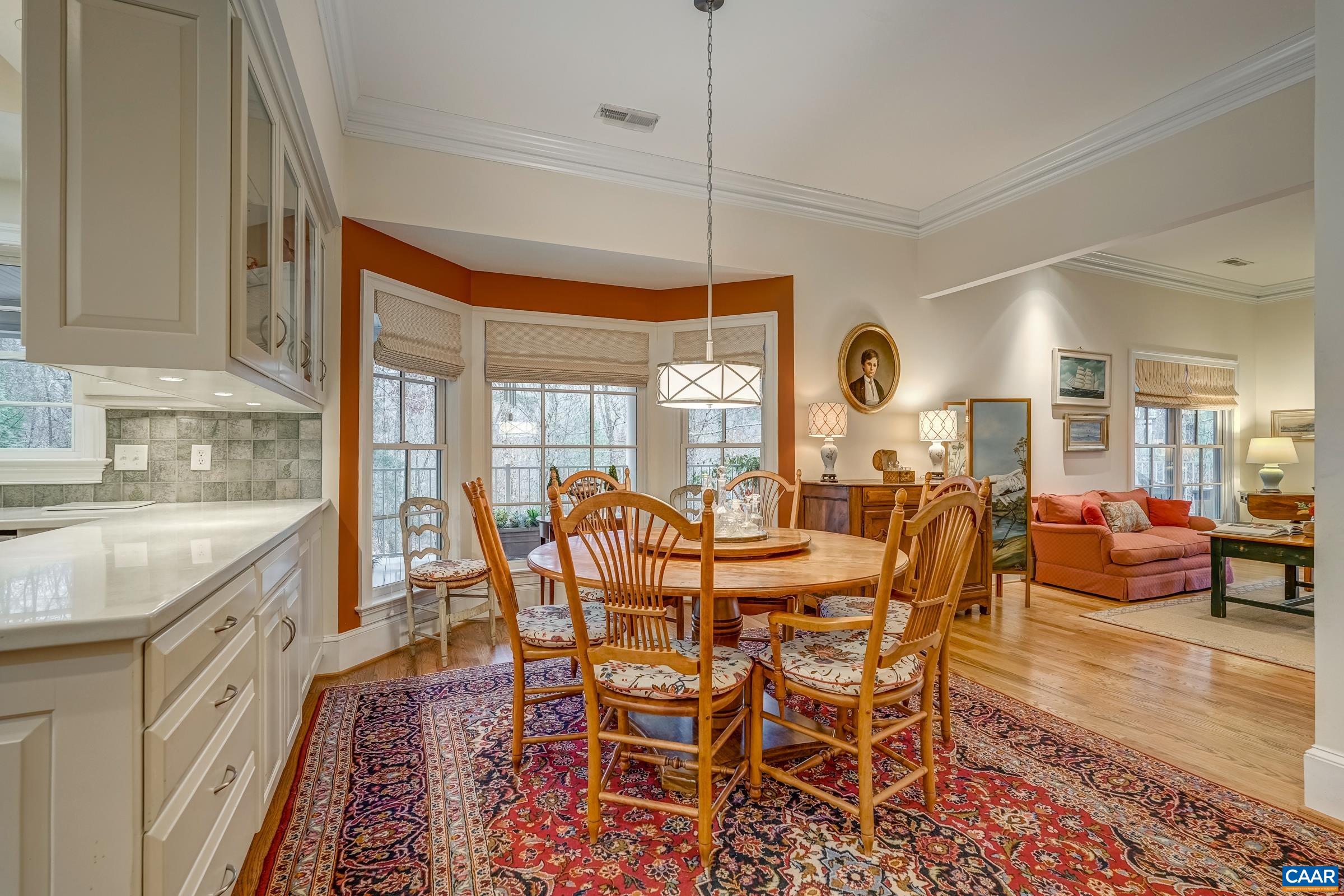 1849 Westerham Street Keswick, VA 22947 - Photo 45 of 75 a view of a dining room with furniture window and wooden floor