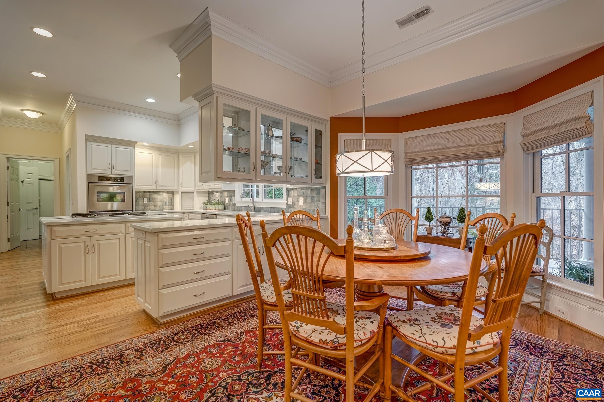 1849 Westerham Street Keswick, VA 22947 - Photo 46 of 75 a view of a dining room with furniture window and wooden floor