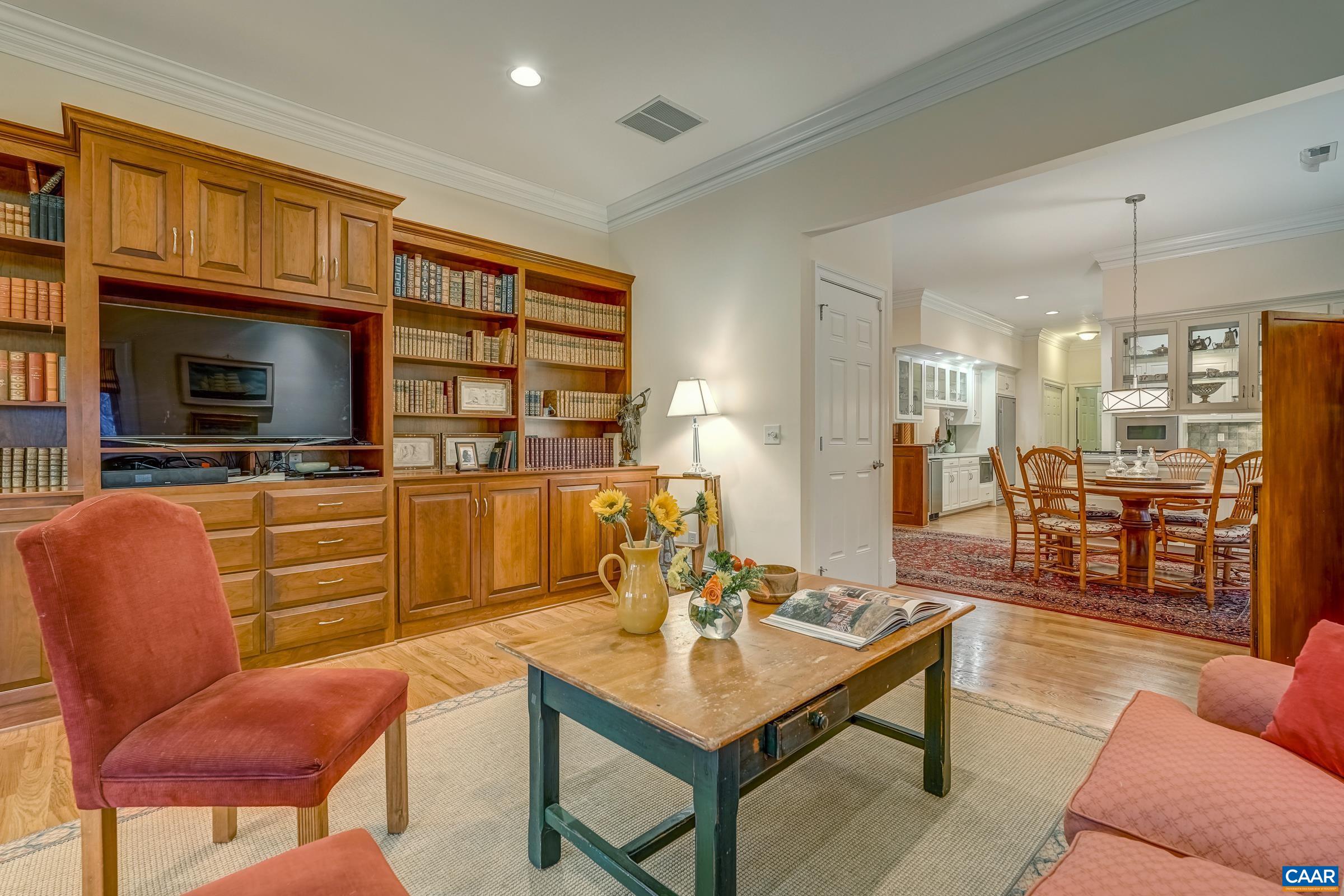 1849 Westerham Street Keswick, VA 22947 - Photo 48 of 75 a living room with furniture kitchen view and a flat screen tv