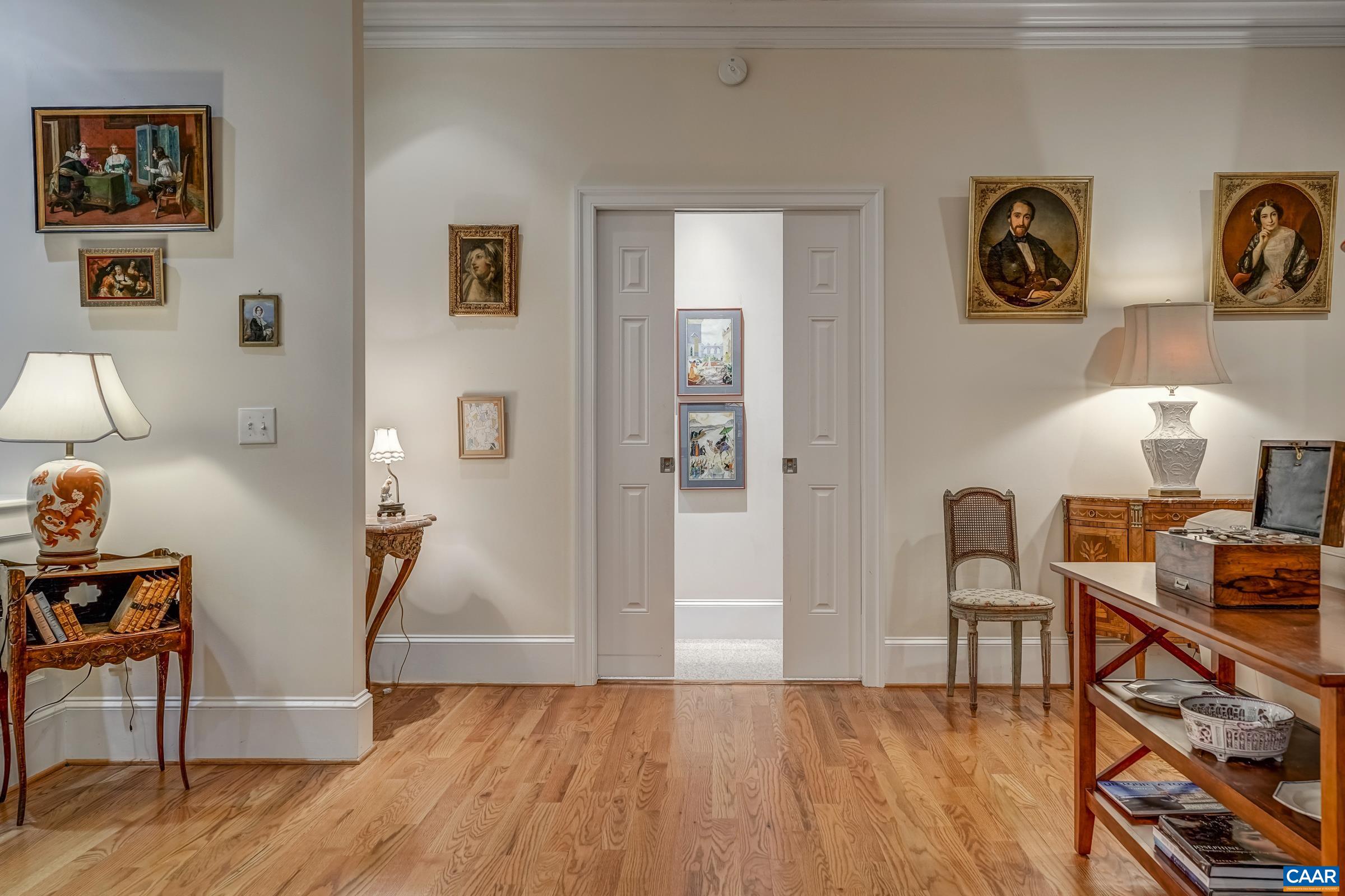 1849 Westerham Street Keswick, VA 22947 - Photo 49 of 75 a view of a workspace with furniture and wooden floor