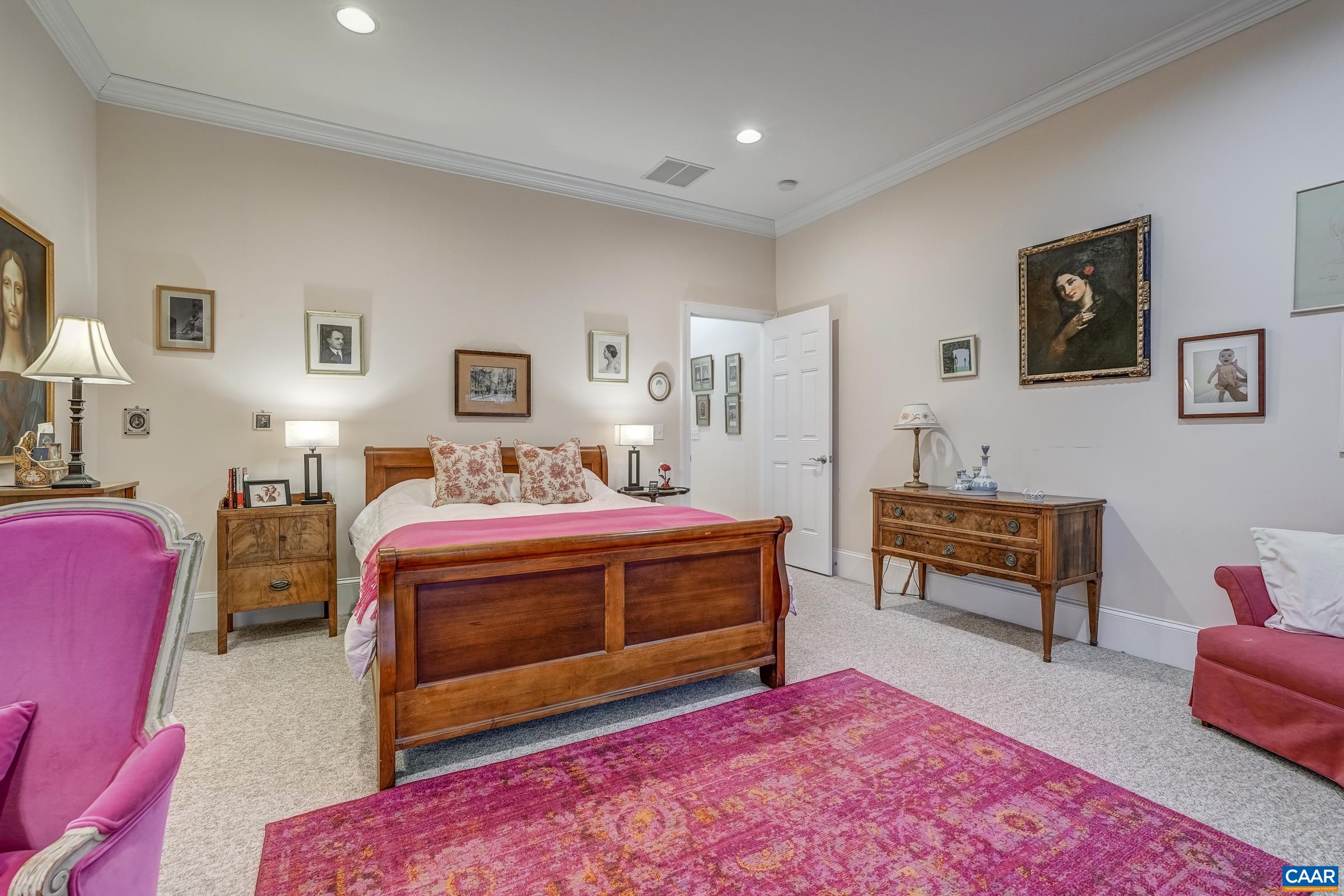 1849 Westerham Street Keswick, VA 22947 - Photo 51 of 75 a living room with furniture a rug and a table