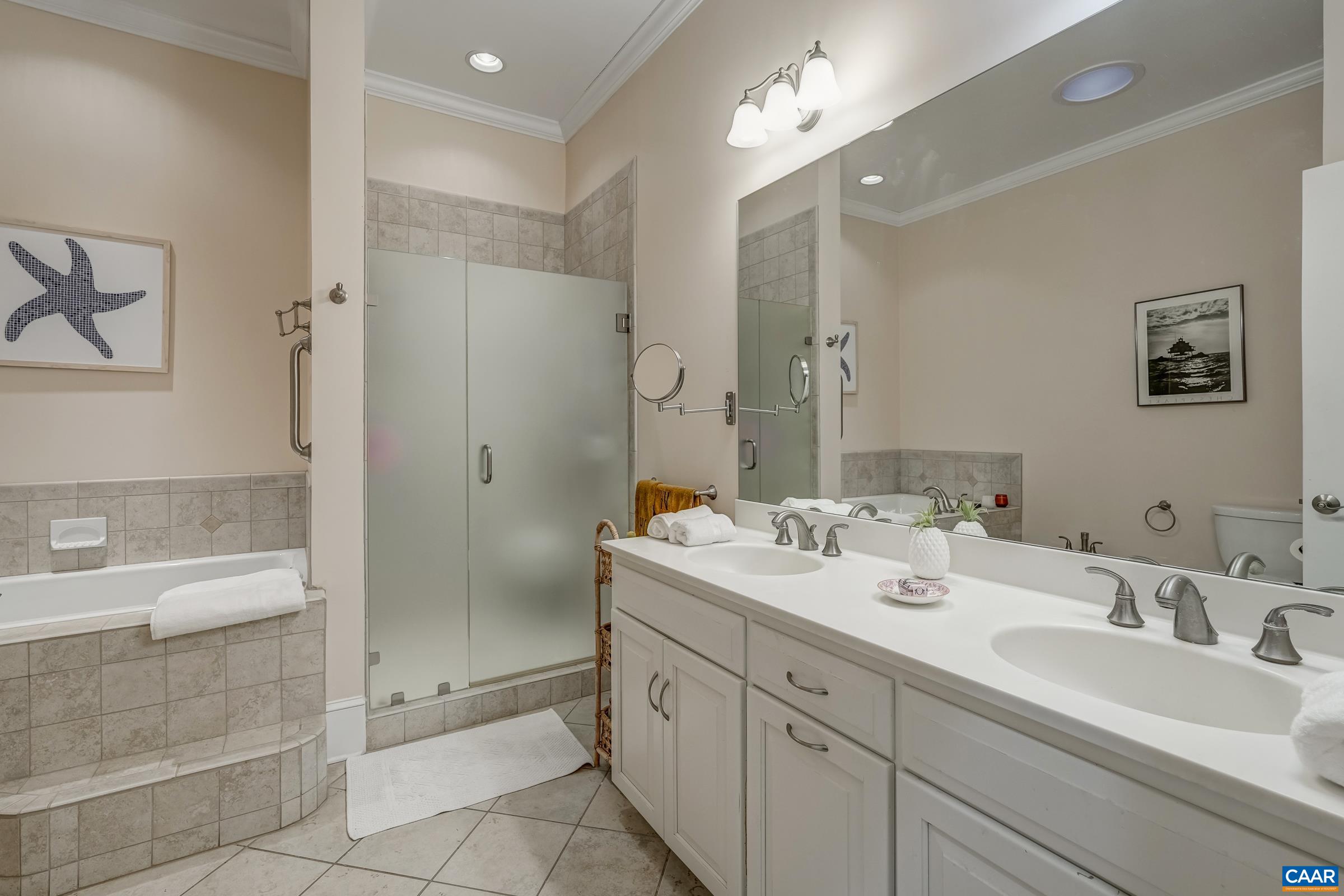 1849 Westerham Street Keswick, VA 22947 - Photo 52 of 75 a spacious bathroom with a double vanity sink mirror and double