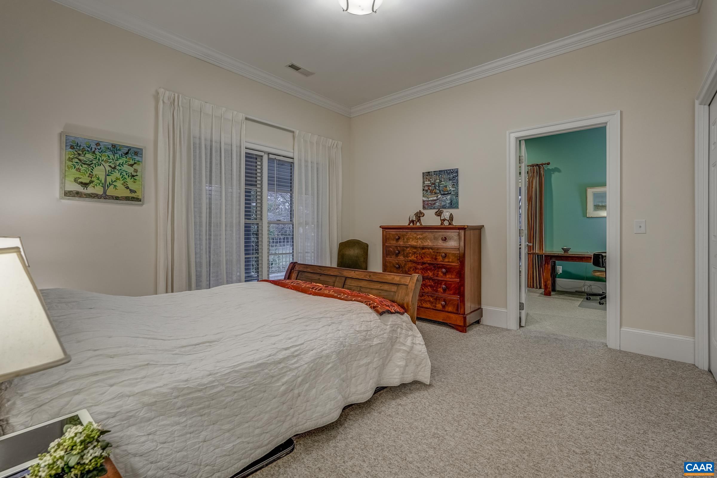 1849 Westerham Street Keswick, VA 22947 - Photo 53 of 75 a bedroom with a bed and a tv