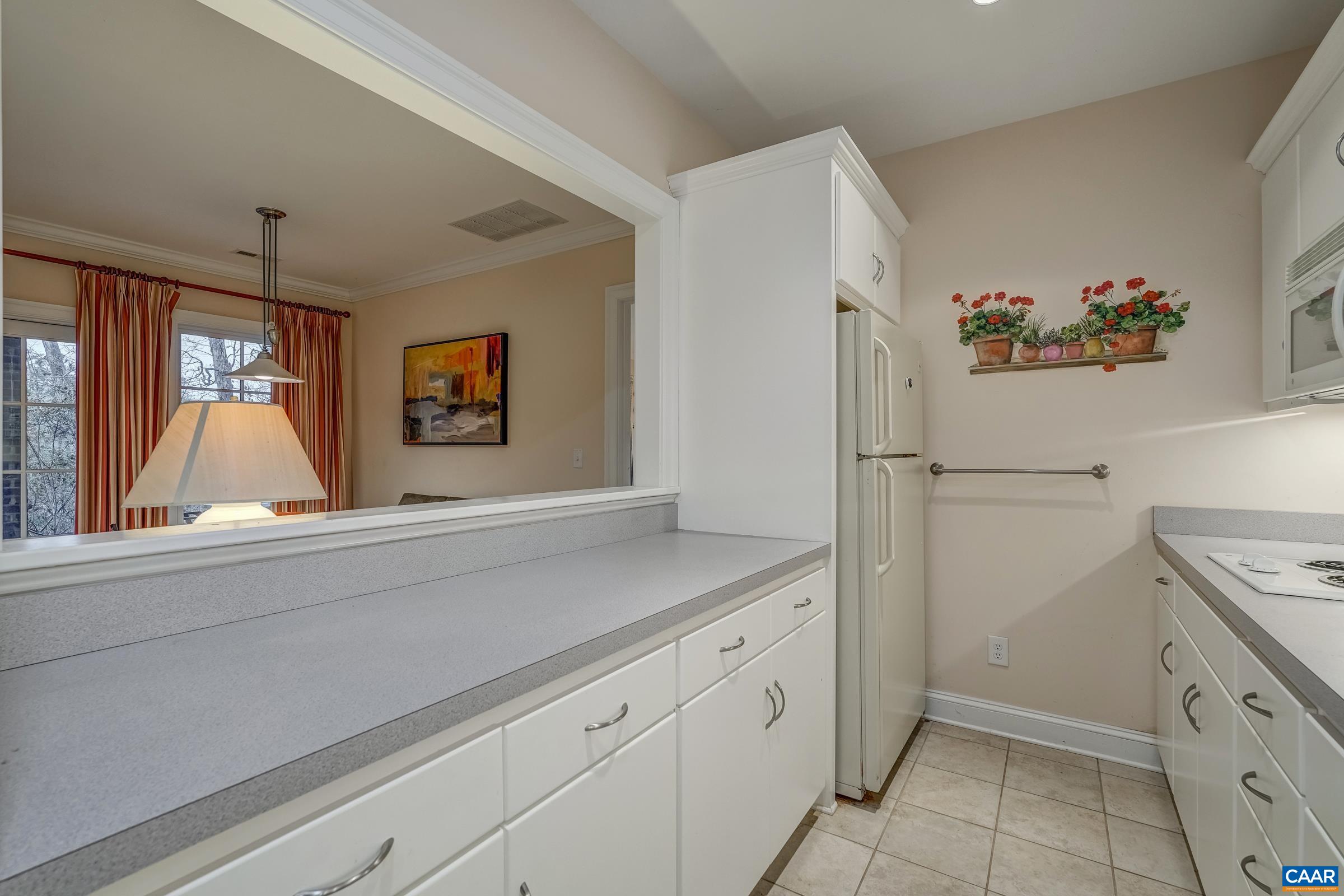 1849 Westerham Street Keswick, VA 22947 - Photo 62 of 75 a kitchen with a refrigerator and a sink