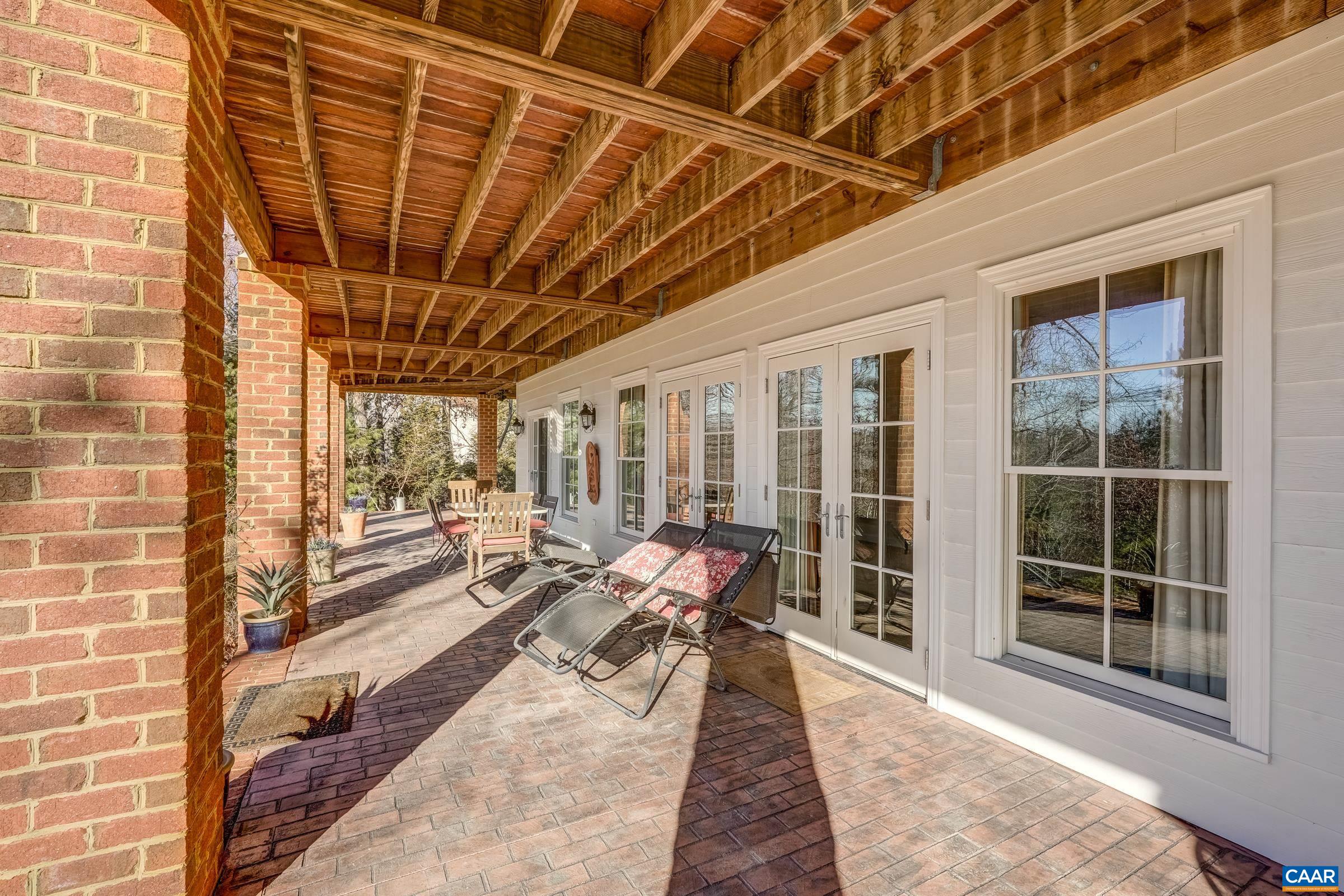 1849 Westerham Street Keswick, VA 22947 - Photo 71 of 75 a lobby with furniture and floor to ceiling window