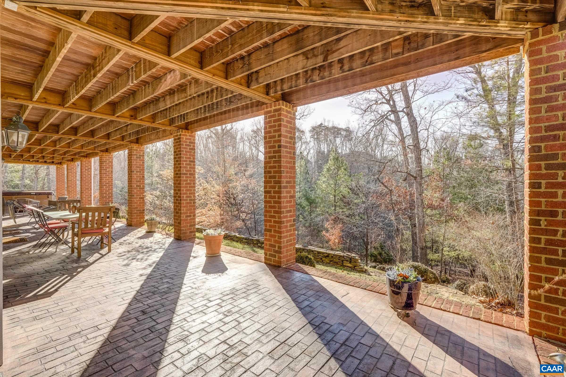 1849 Westerham Street Keswick, VA 22947 - Photo 73 of 75 a bedroom with a bed and wooden floor