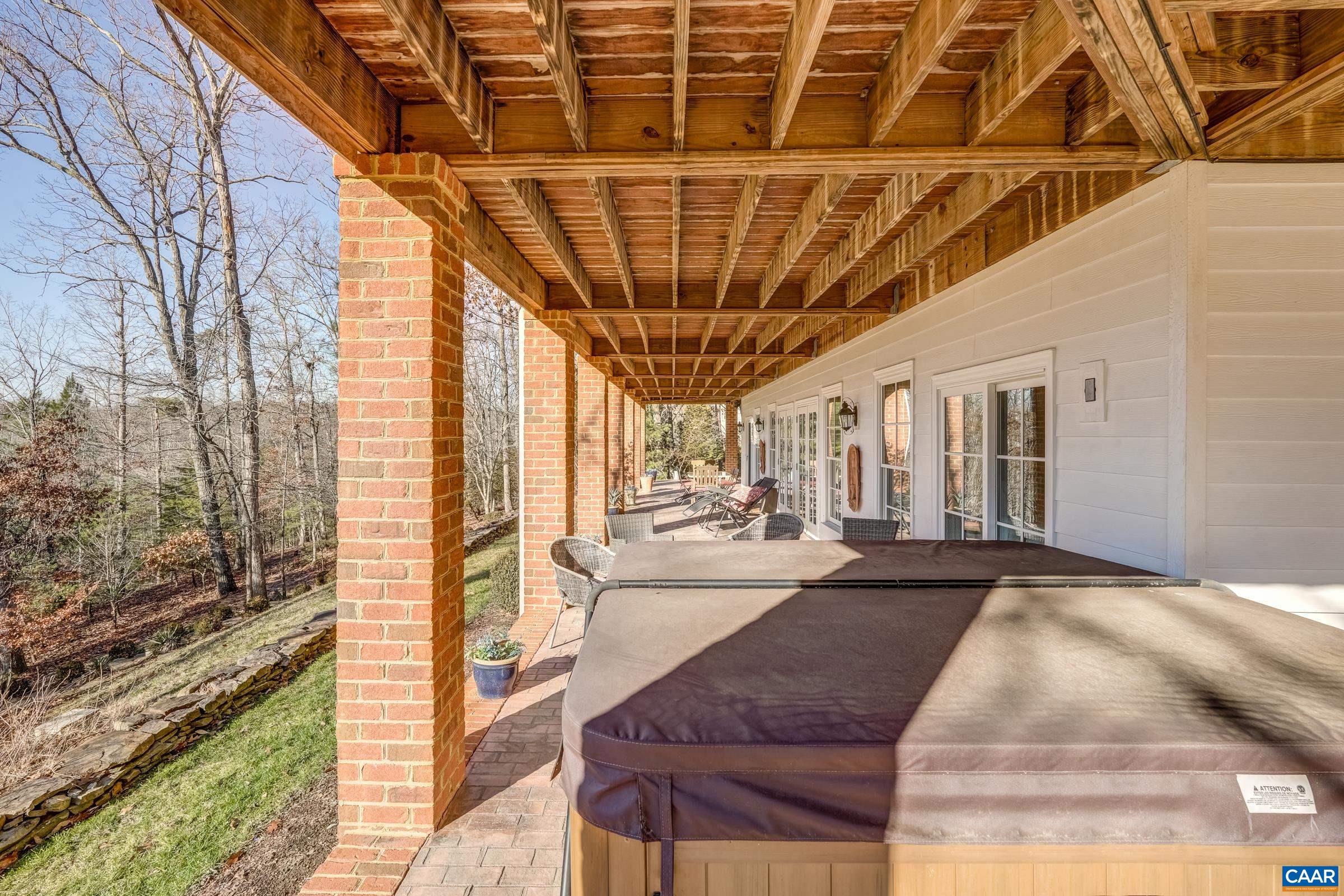1849 Westerham Street Keswick, VA 22947 - Photo 75 of 75 a living room with a couch and wooden floor