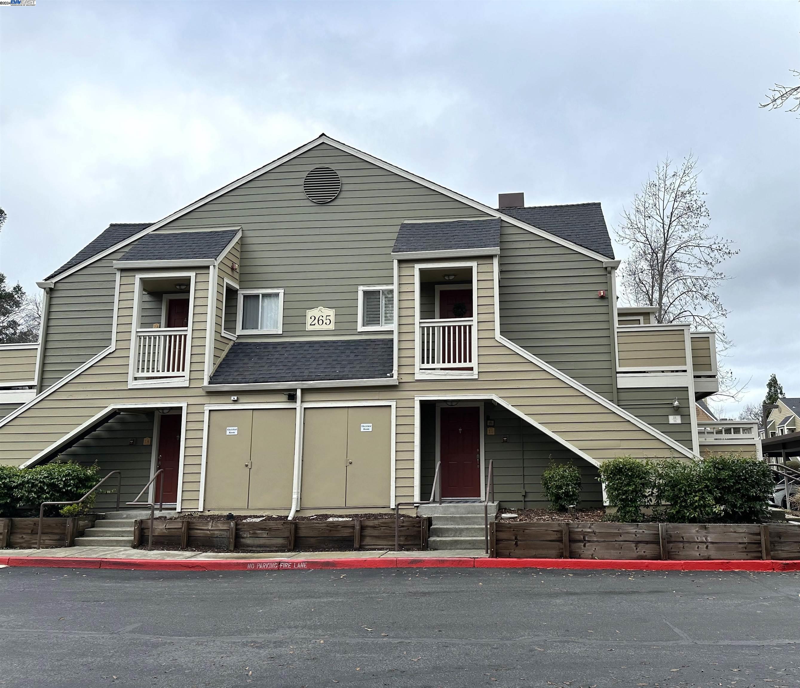 265 Reflections Drive, Unit 11 San Ramon, CA 94583 - Photo 1 of 1 a front view of a house with garage