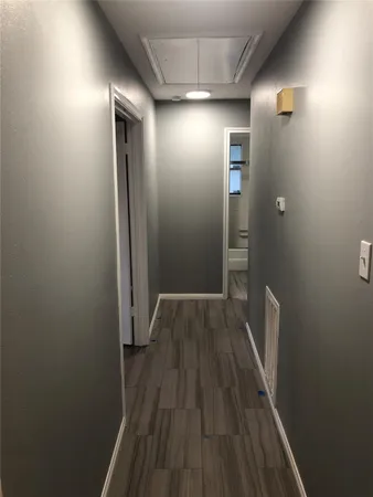a bathroom with a shower and a toilet