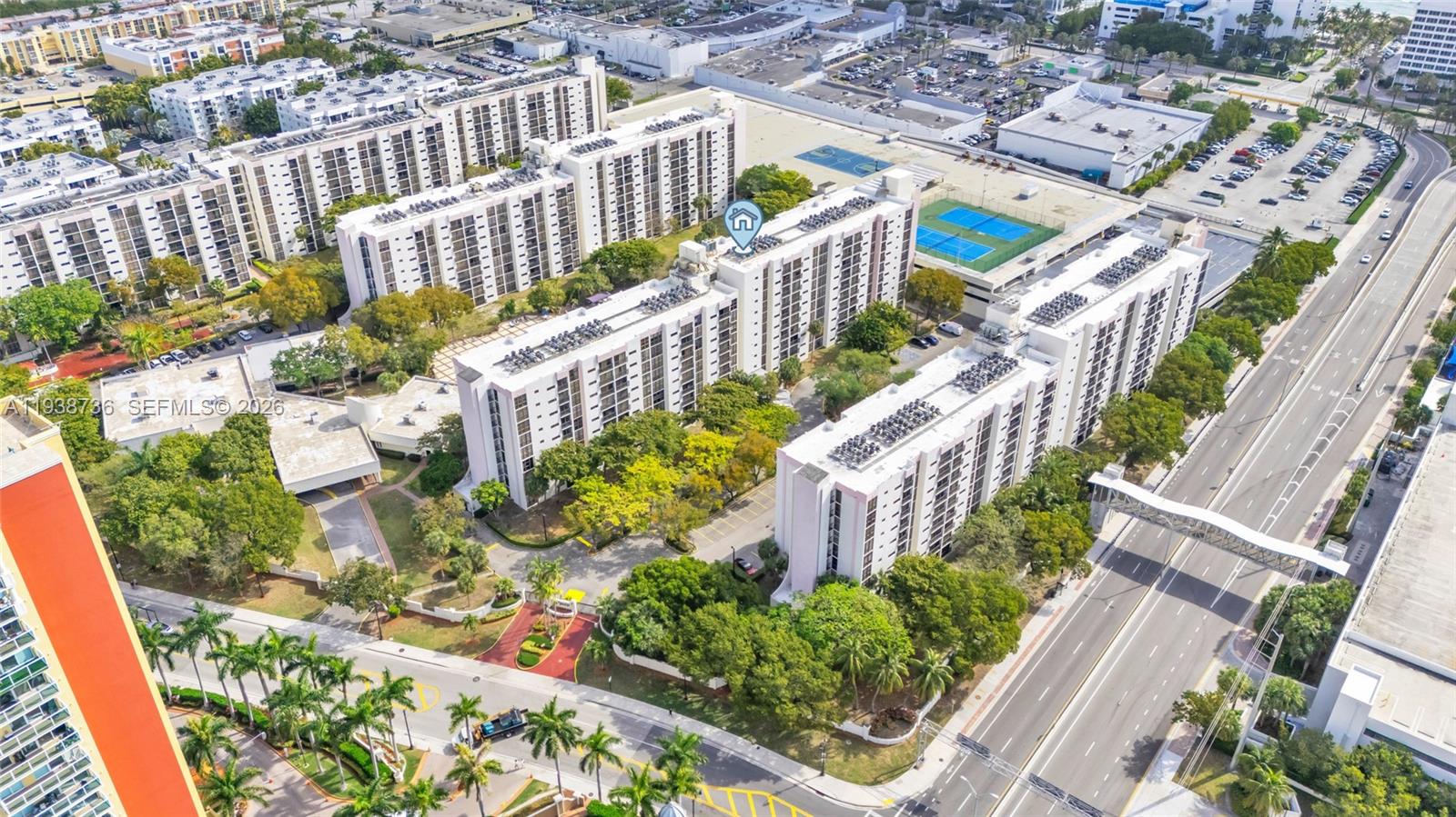 16919 North Bay Road, Unit 118 Sunny Isles Beach, FL 33160 - Photo 19 of 20 a view of a city with flower in front of house