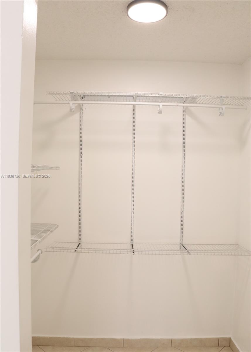 16919 North Bay Road, Unit 118 Sunny Isles Beach, FL 33160 - Photo 7 of 20 a bathroom with a shower