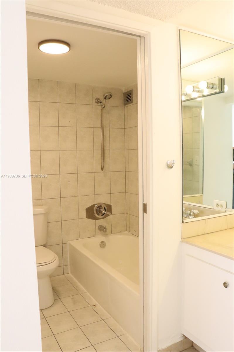 16919 North Bay Road, Unit 118 Sunny Isles Beach, FL 33160 - Photo 8 of 20 a bathroom with a bathtub and a shower